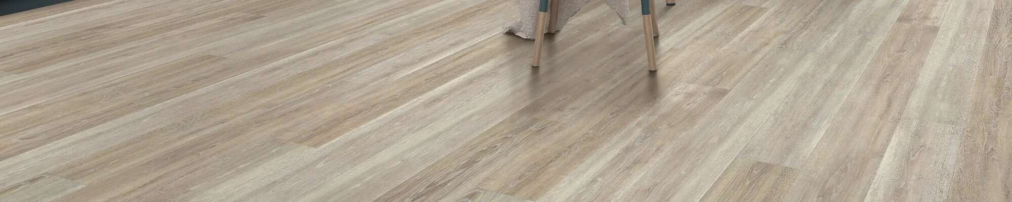 Woman choosing new flooring in the store from Carpet Remnant Outlet in Spokane, WA